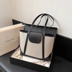 Structured tote bag with flap closure